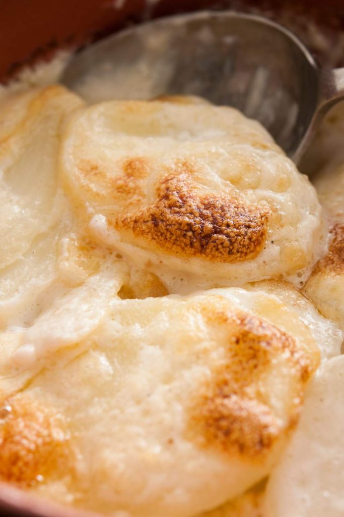 Close-up of dauphinoise potatoes with a golden top.