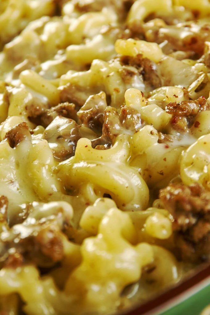 Steamy cheeseburger pasta with stretchy melted cheese and ground beef, ready to be served.