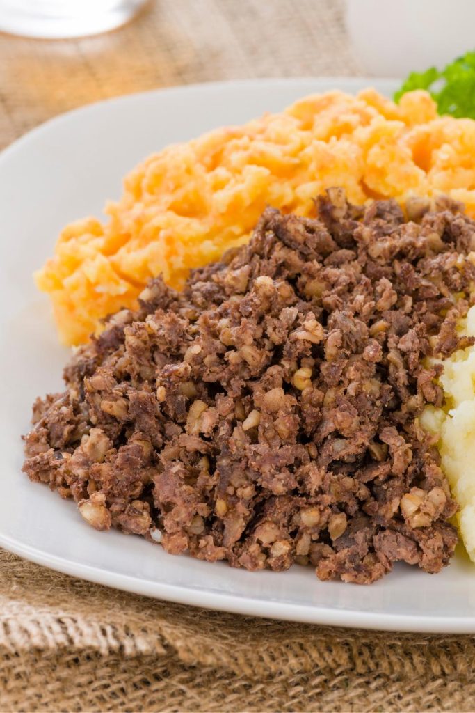 Plate of Slow Cooker Haggis with neeps and tatties