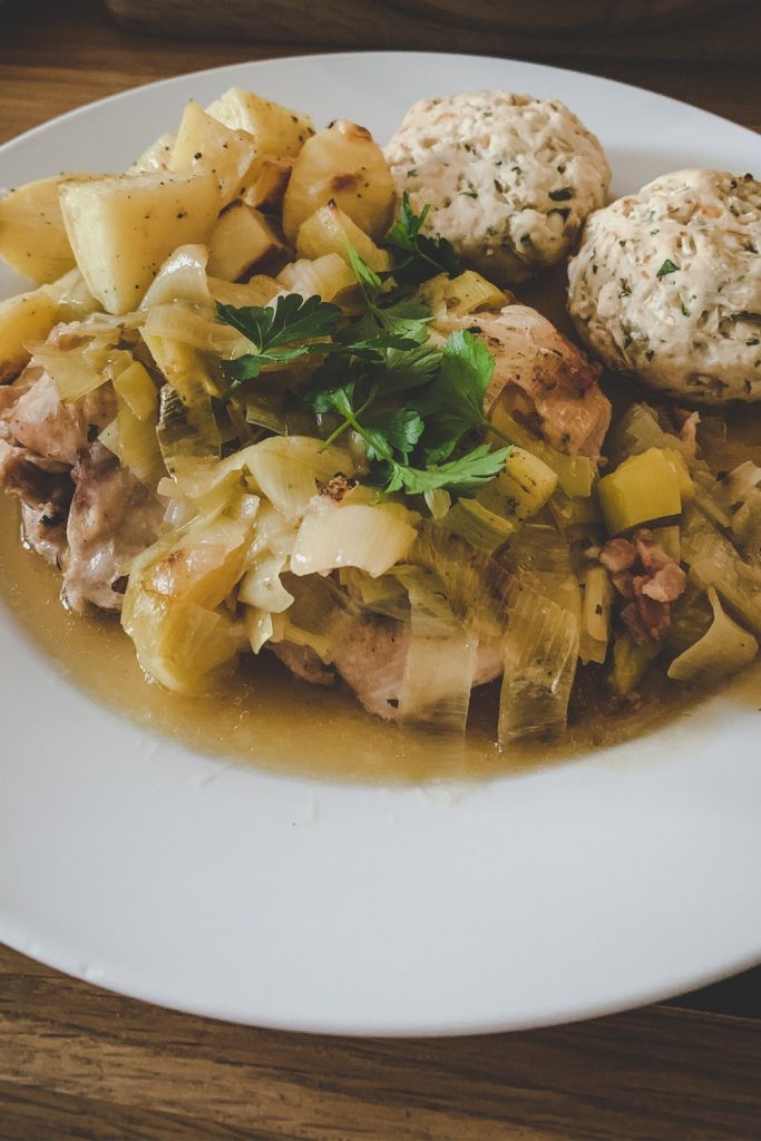 Slow Cooker Chicken and Leek Casserole with parsley garnish.