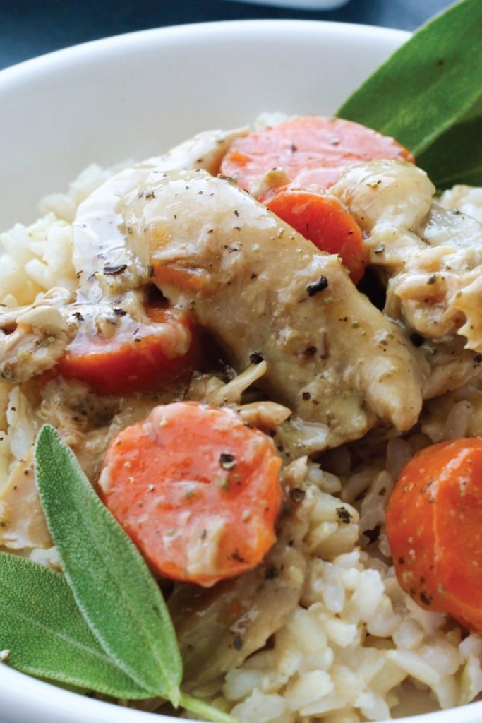  turkey thighs seasoned with sage, served with rice and vegetables.