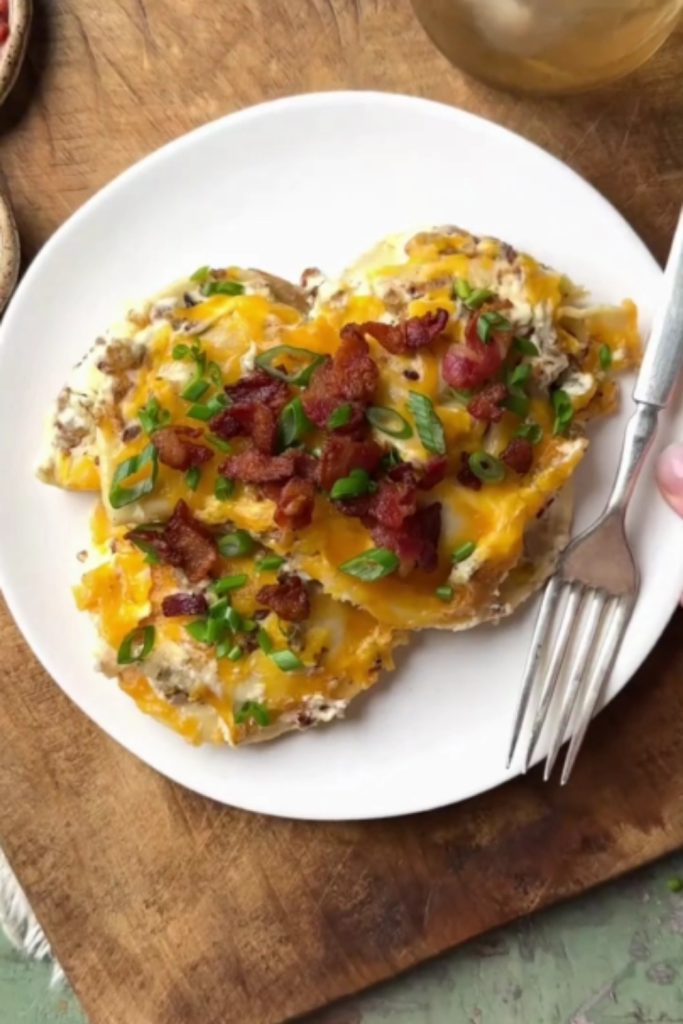 Slow Cooker Pierogi Casserole with cheese, bacon, and green onions.