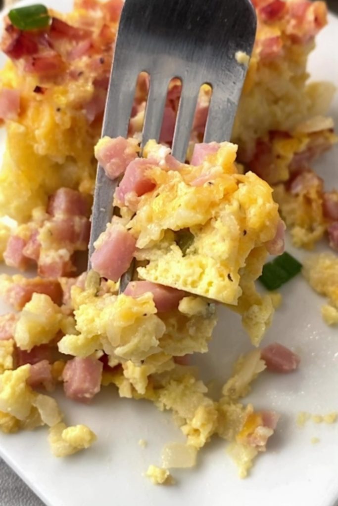 Ham Hash Brown Casserole on a fork.