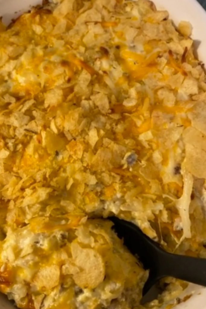 Slow Cooker Hobo Casserole showing the crispy cheese and potato chip topping.