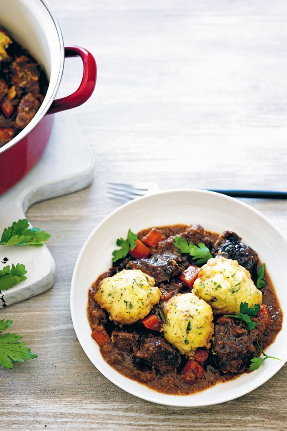 Slow Cooker Beef And Guinness Stew With Buttermilk Dumplings